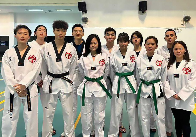 Mr Pablo Laborde Fernandez (first on the right in the back row) and his teammates in the LU Taekwondo Team.
