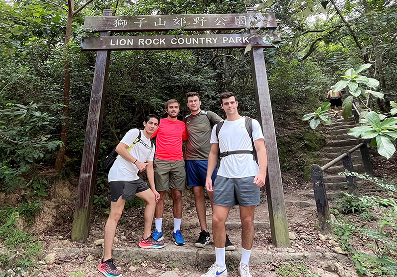 Christian hiking with friends in Lion Rock Country Park, Hong Kong.